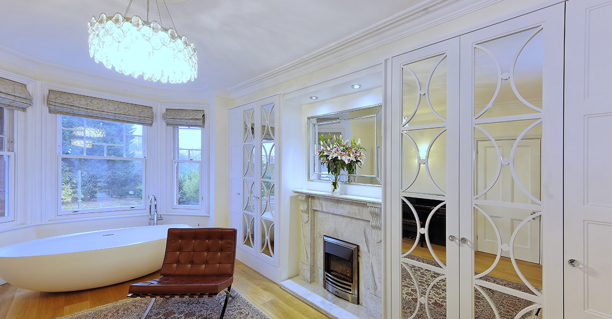 white hand painted fret work bedroom